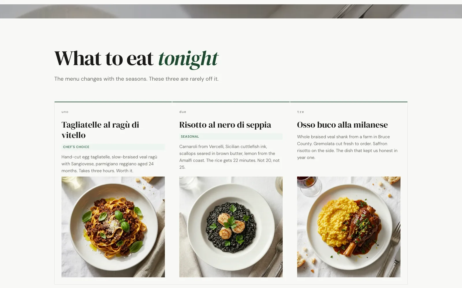 The ‘What to eat tonight’ section — three signature dishes with photography and crimson prices